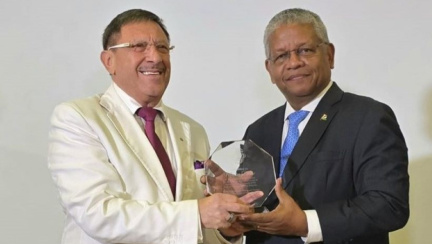 Maxim Behar with Special Award from the President of Seychelles Wavel Ramkalawan